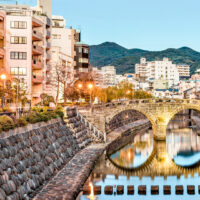 What to Eat in Nagasaki: Meganebashi, Nagasaki's famous landmark bridge with two rounded arches that when reflected in the river below look like a pair of glasses.